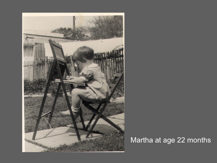 photo of a small child at an easel: Martha at 22 months
